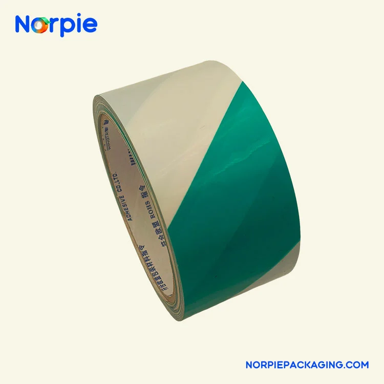 Grønn og hvit advarselstape